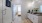 bathroom with a large mirror and glass shower